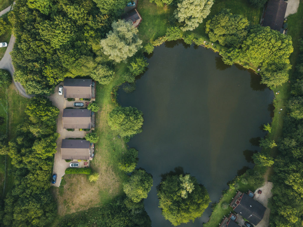 An aerial shot of cottages in Devon, UK